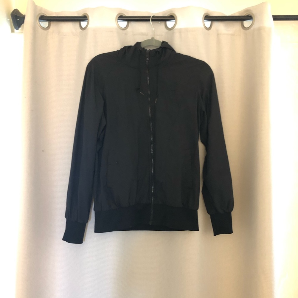 Nike hooded wind breaker.